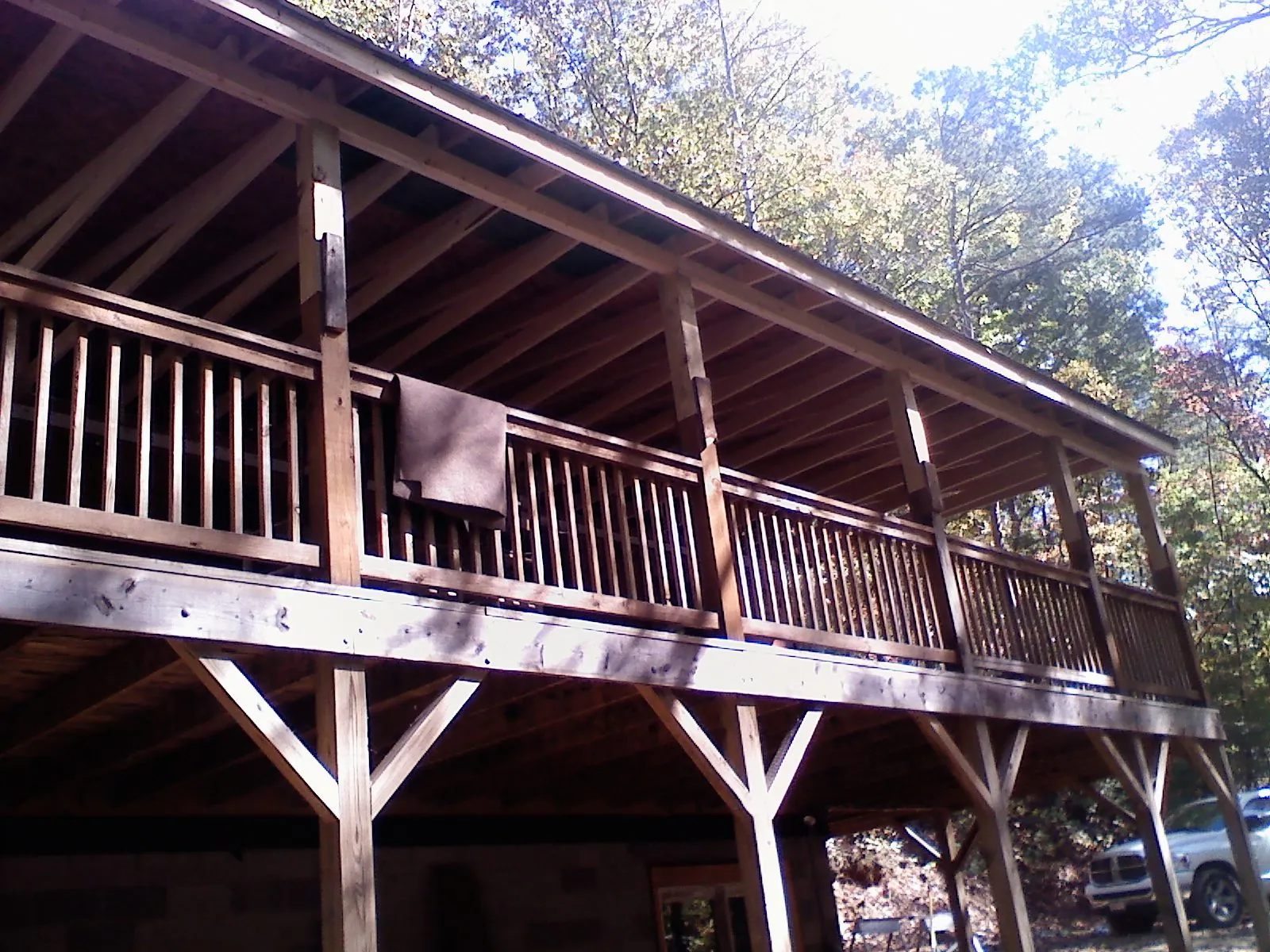 Timber framing under a new elevated porch and deck — Roof Leak Repair in Faith by Roofing Brothers